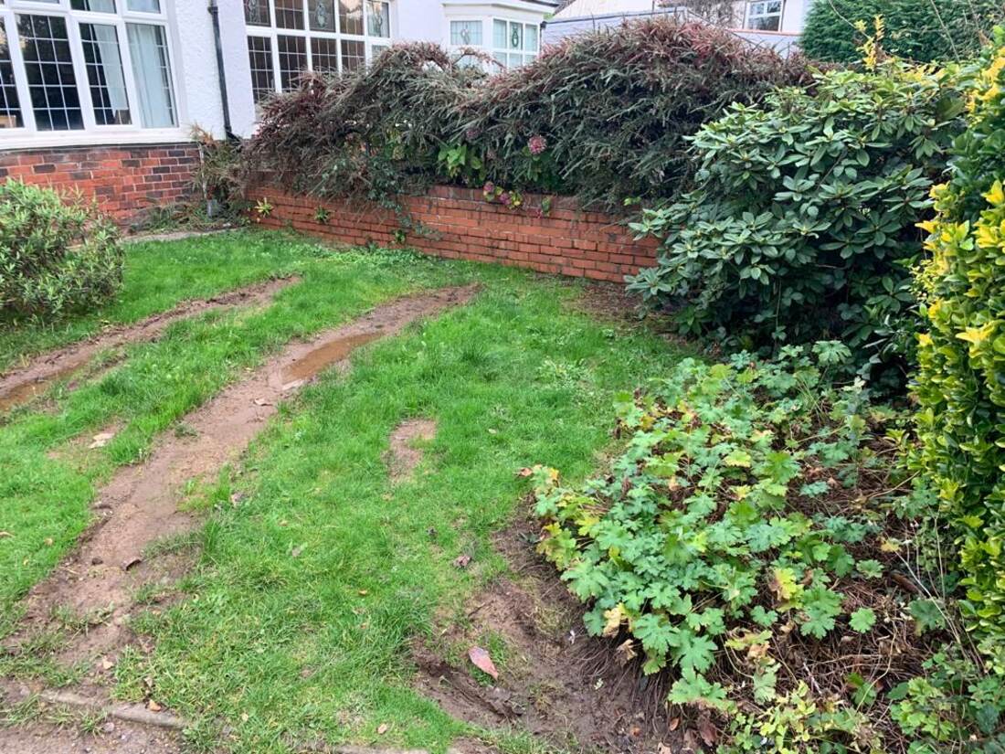 Front garden with rutted, waterlogged lawn before work started