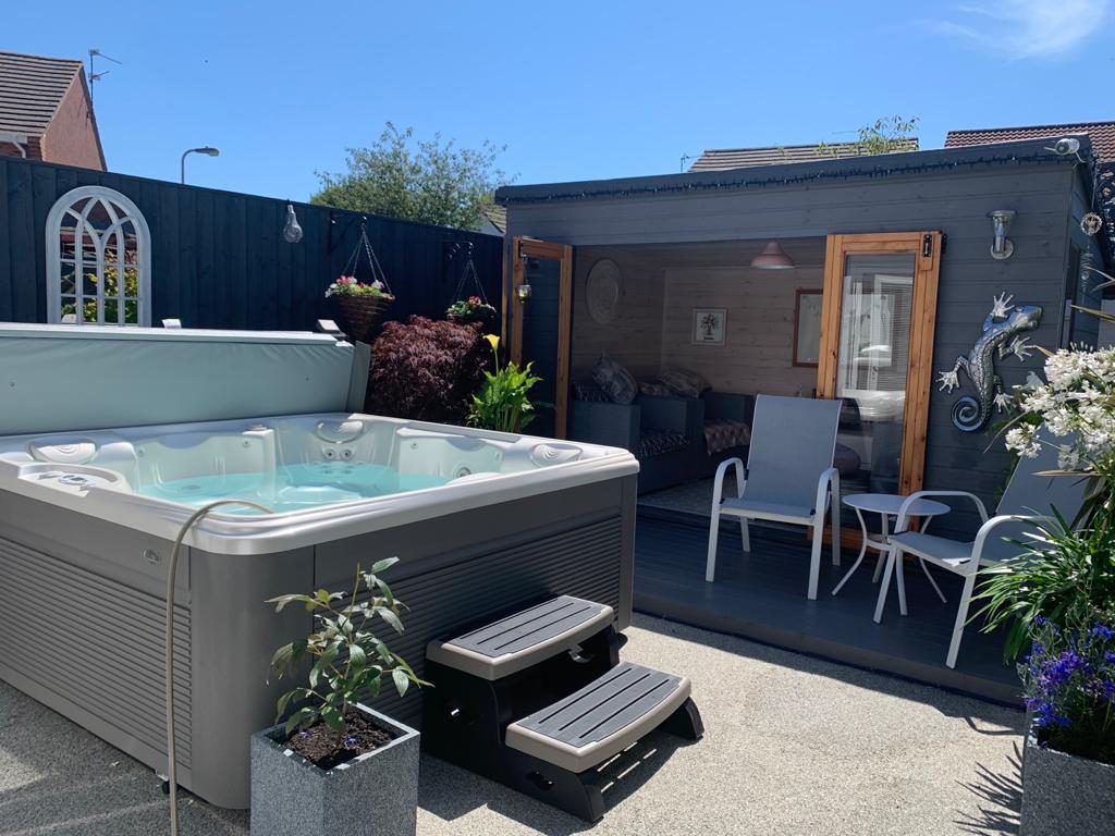 Finished garden deck and paved hot tub area