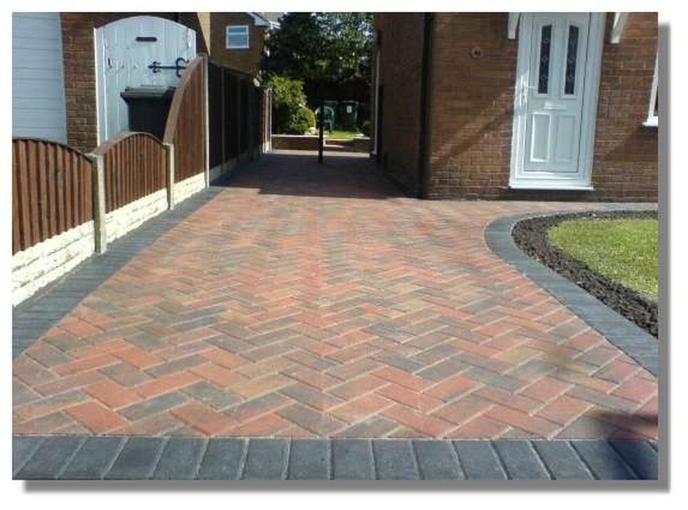 Herringbone block paving with contrasting charcoal border